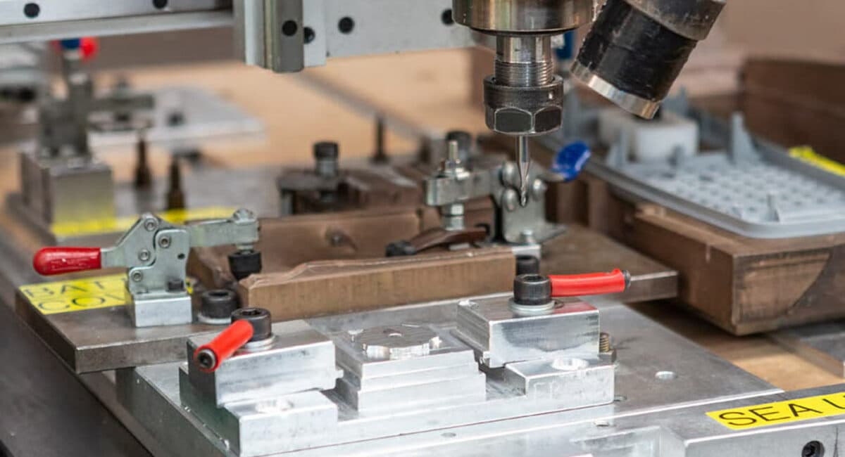 Mould tool components on a workshop bench